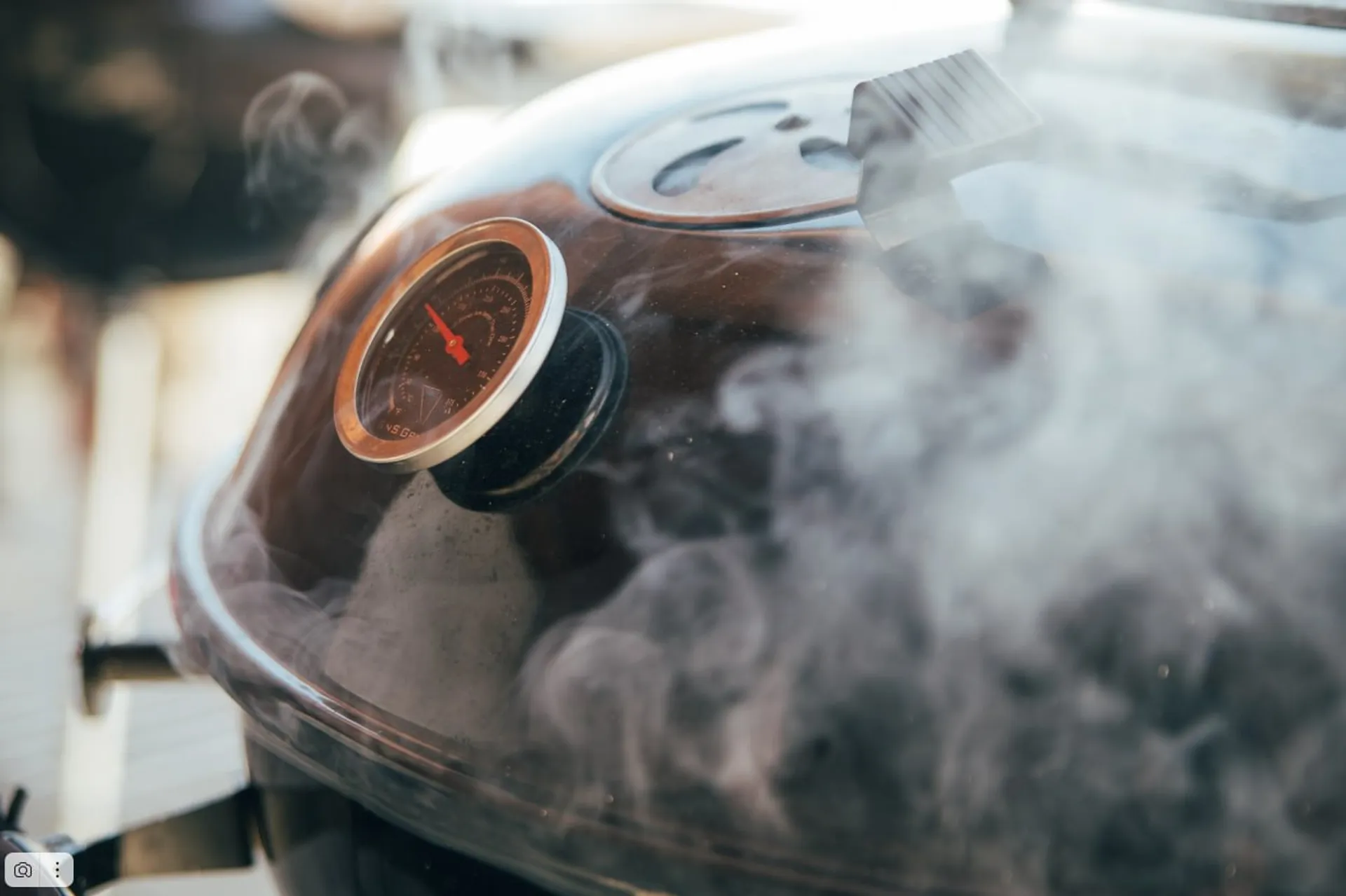 Smoking wood chunks on a charcoal grill